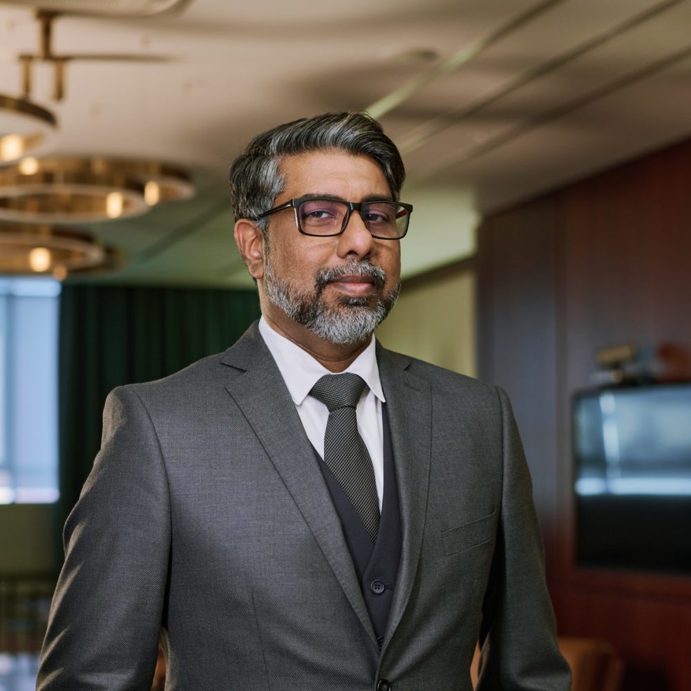 Confident mature chief executive officer Confident mature chief executive officer in formalwear looking at camera against interior of spacious boardroom for business meetings
